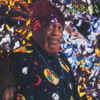 sunra_reflectionsinblue_c.jpg (23633 bytes)